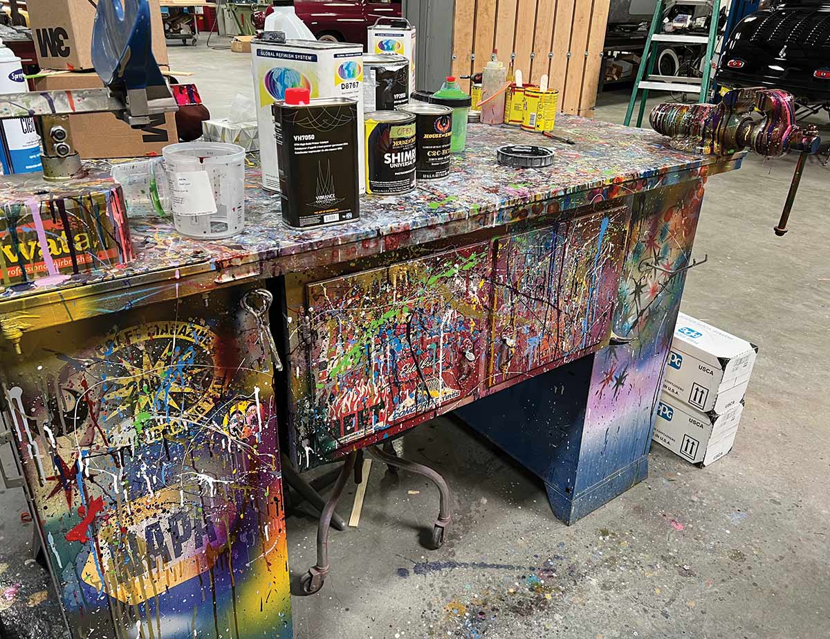 a paint covered desk