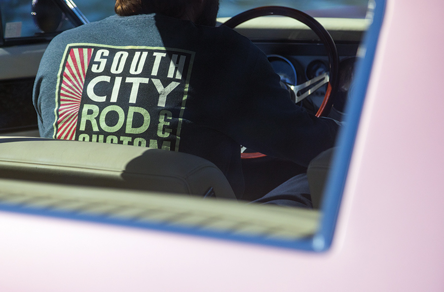 view through rear wind window in car of driver in a '64 Buick Riviera