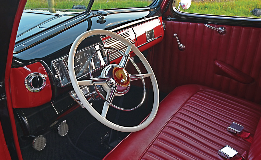 steering wheel and front seat of a '39 Ford DeLuxe Coupe