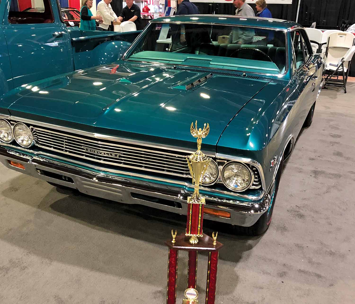 the front of the ’66 Chevelle with the first place trophy placed near it