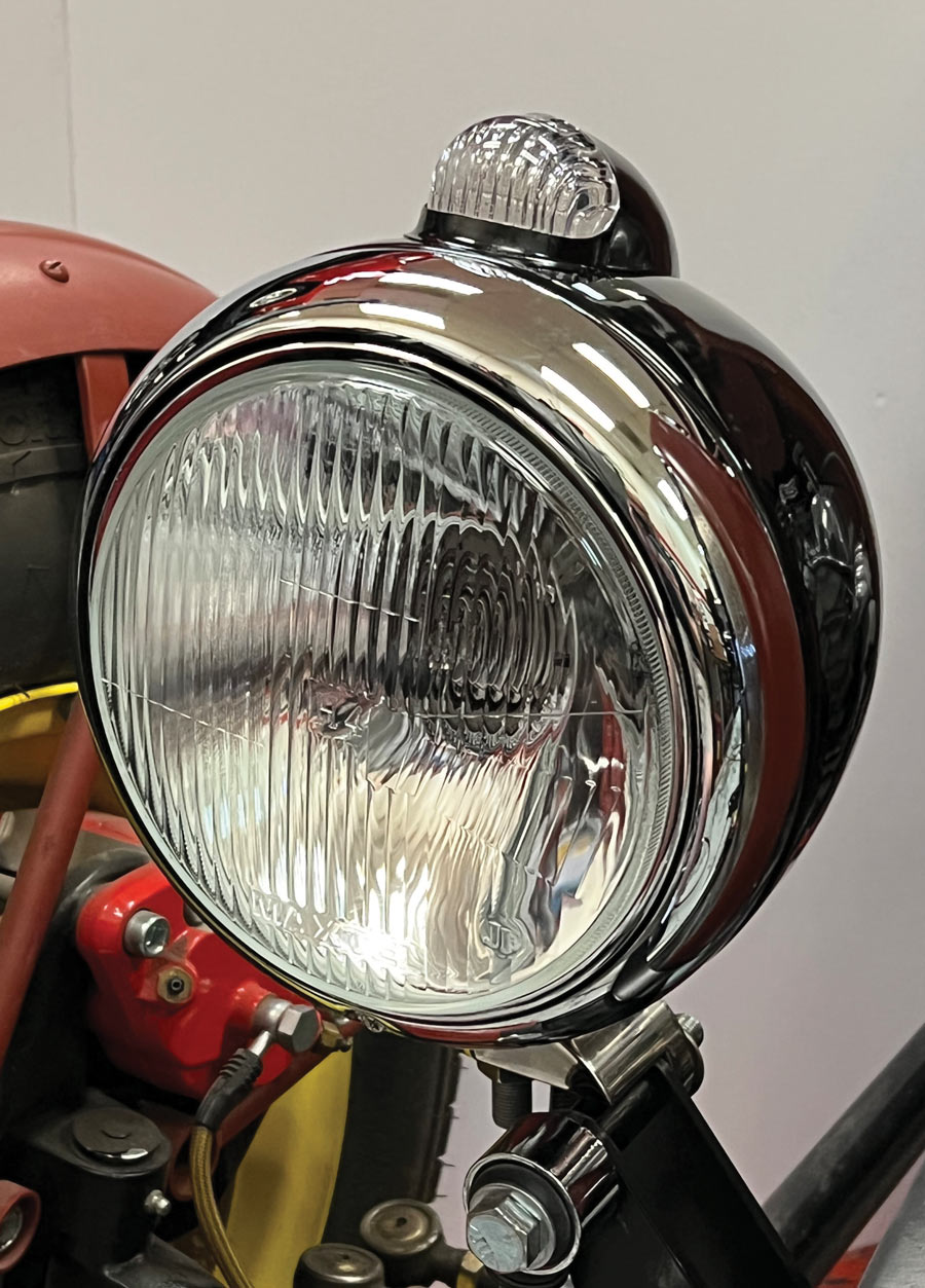Our SM black Guide 682-C 12V H4 Headlight/Turn Signal is finalized and mounted, ready to light the way. 
