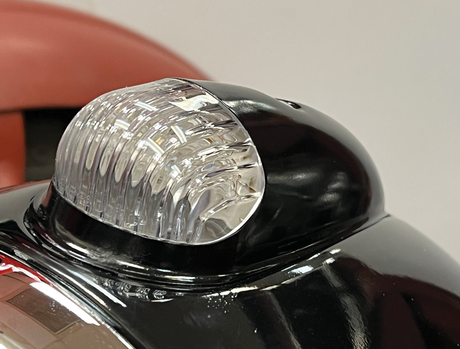 The clear lens turn signal is a five LED panel that lights yellow when in use. 