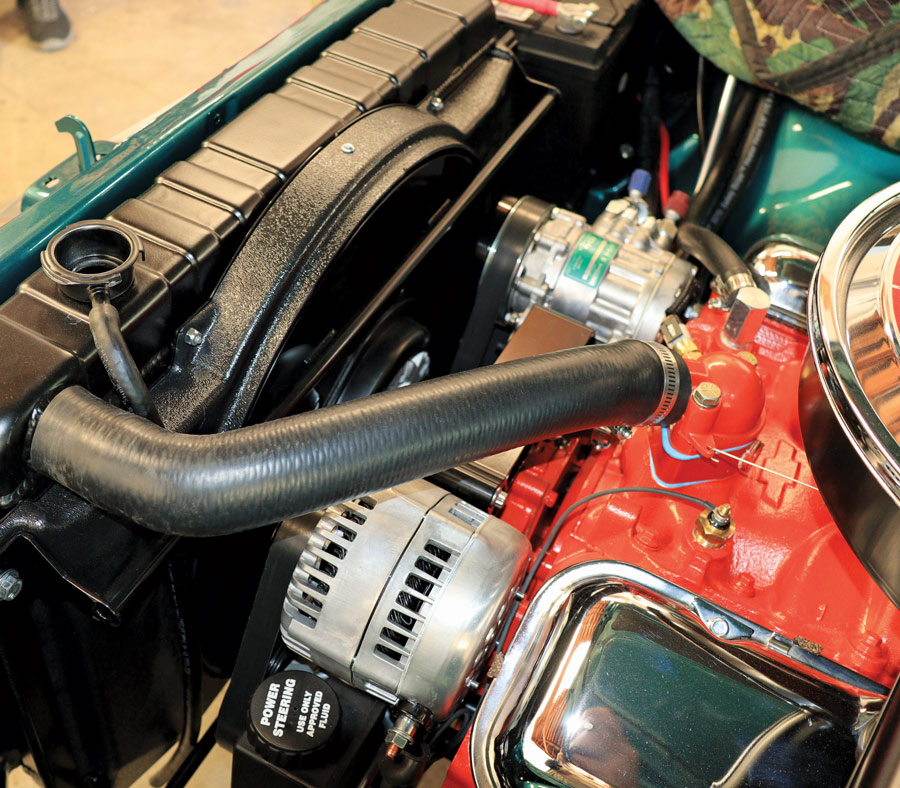 all mounting bolts removed except the driver side lower bolt