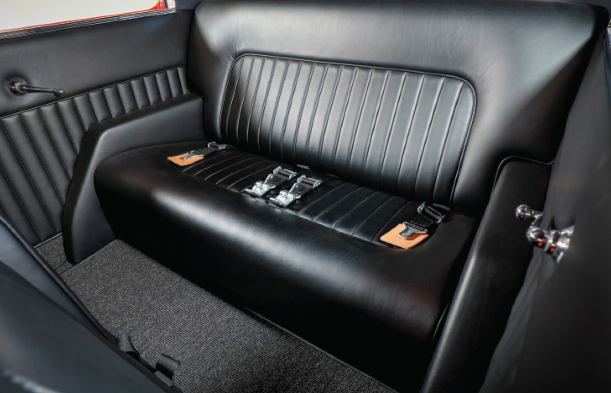 ’32 Ford Tudor Sedan's black leather seats