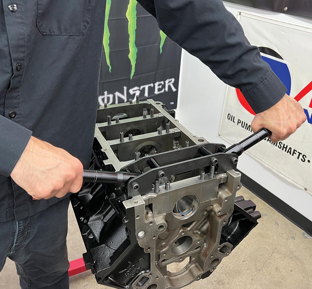 mechanic uses a Summit Pro LS Main Cap Puller (PN SUM-900339) to remove the LS main caps