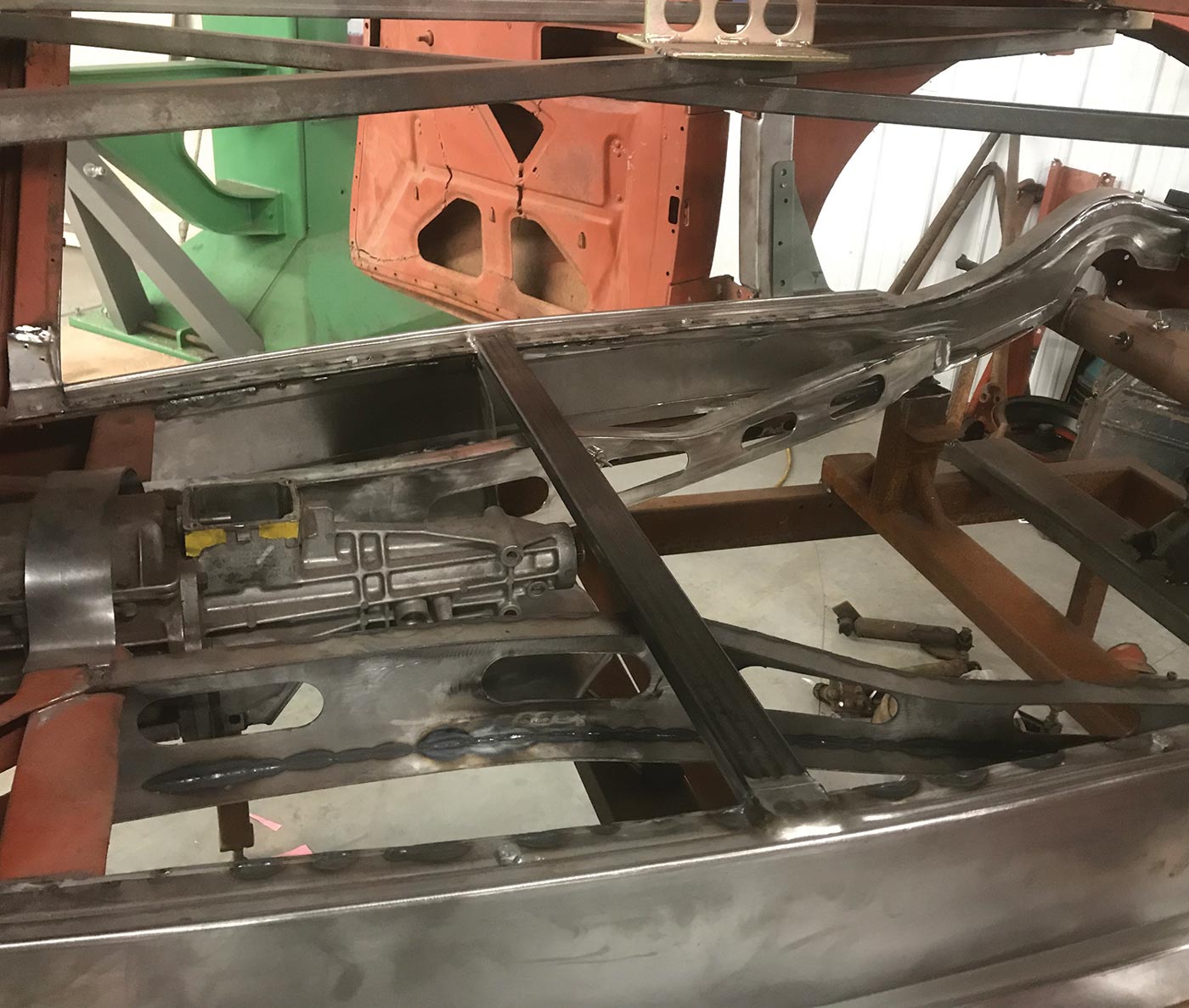 closer view  of the inside the car body at the bracing