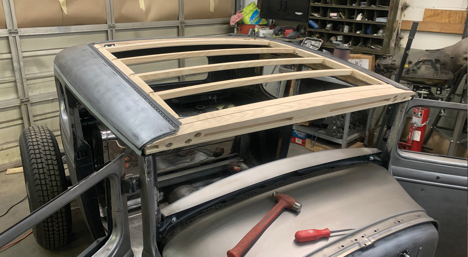 three quarter top view of the coupe roof with the visor removed and wood in the interior