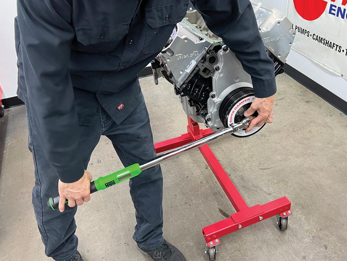 man holding torque wrench