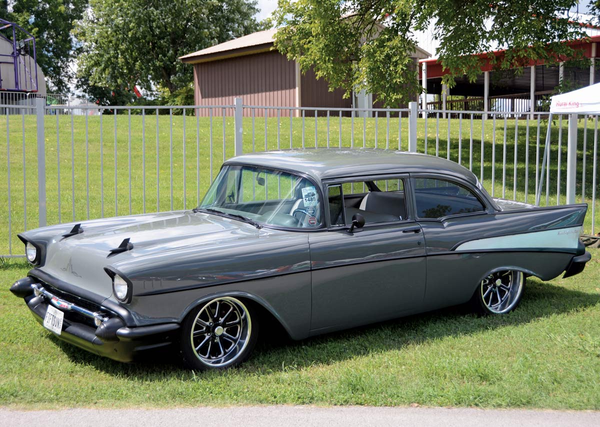 Gray and black trimmed '57 Chevy coupe