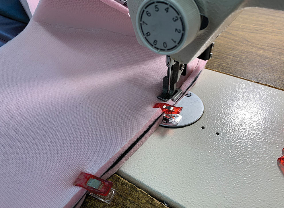 Here two of the pieces of the Jeepster seats are being sewn together. The difference between stitch line and the edge of the material is the seam allowance.