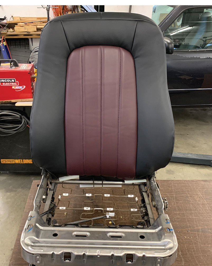 The seat back was slipped over the molded seat back foam—the plastic retainers can be seen at the bottom of the cushion.