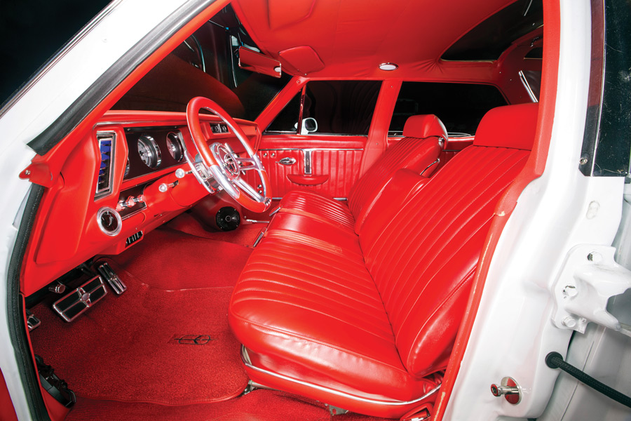 red interior of a '72 Oldsmobile Vista Cruiser