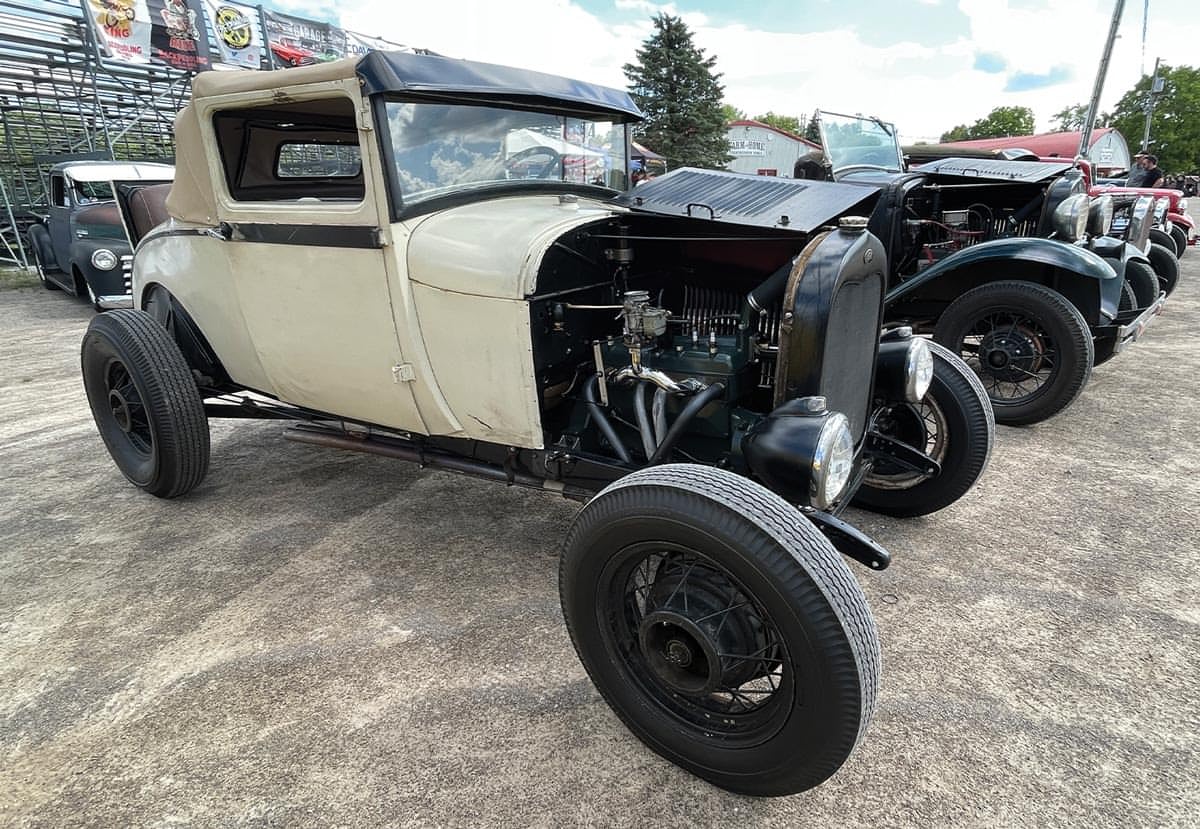 an ivory Model A sports coupe