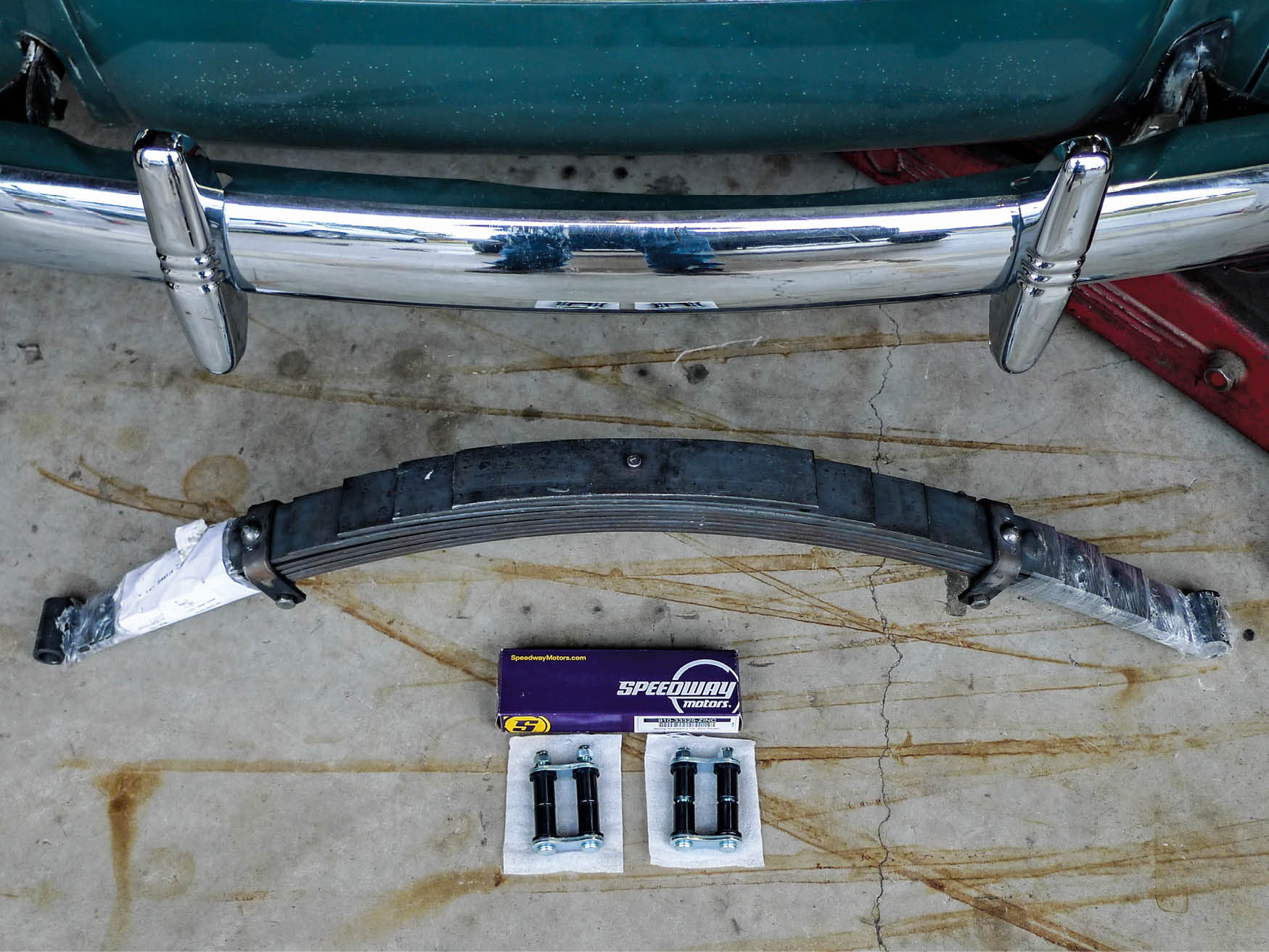 In back, Speedway Motors PN 5803740 rear spring (2-1/2-inch drop) and PN 91033324 2-1/4-inch spring shackles.