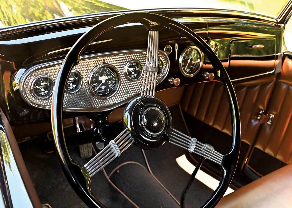 Black steel dash and machined aluminum gauge cluster cowl