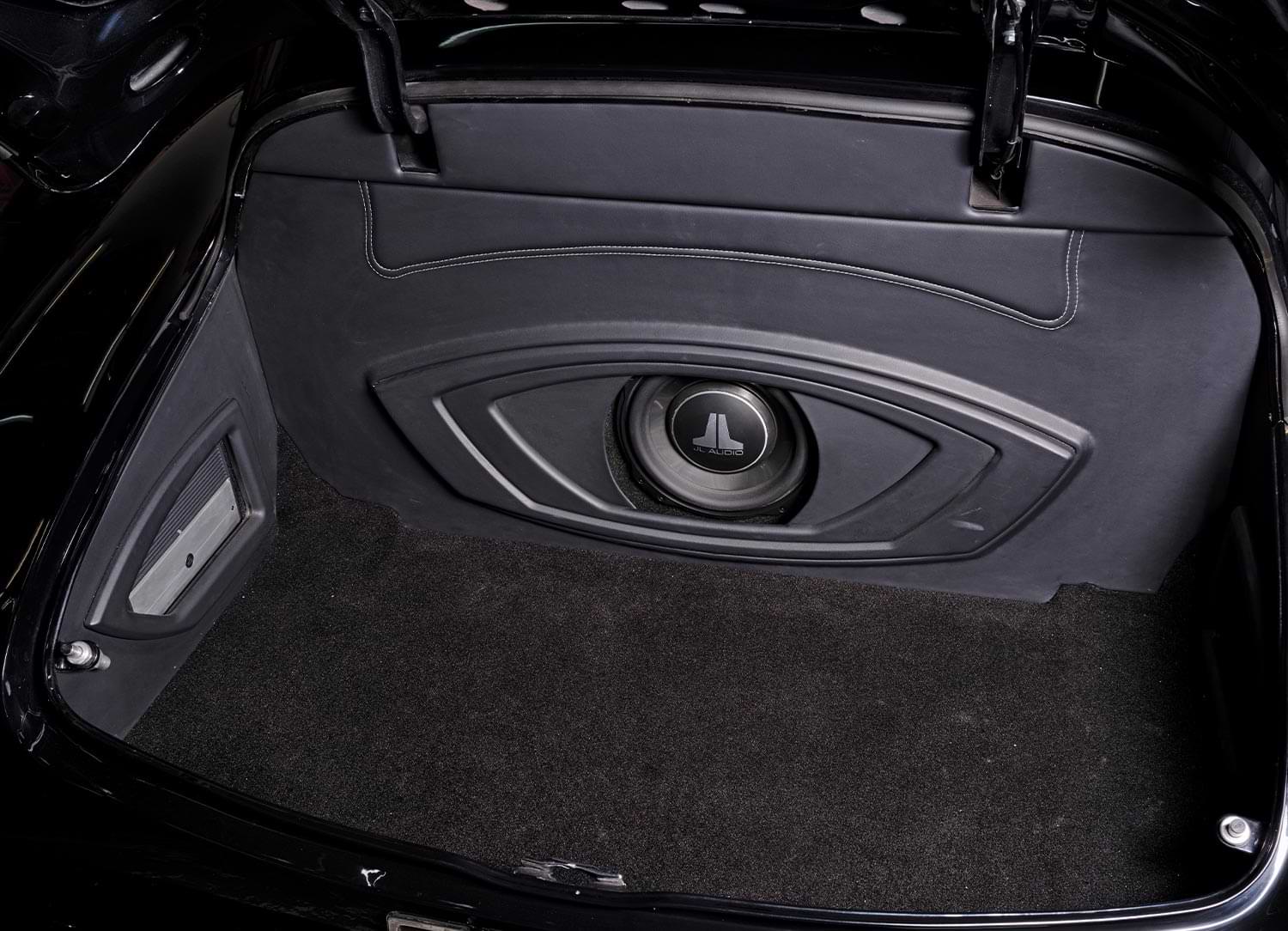 the ’49 Chevy Fleetline's boot, featuring a JL Audio speaker