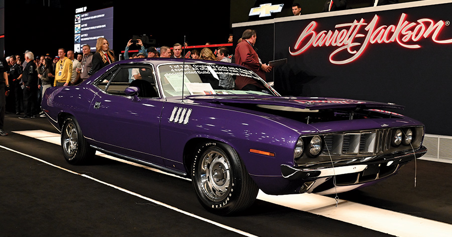 A Purple car on display for an auction