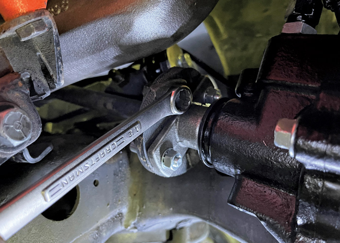 tightening the setscrew and lock nut