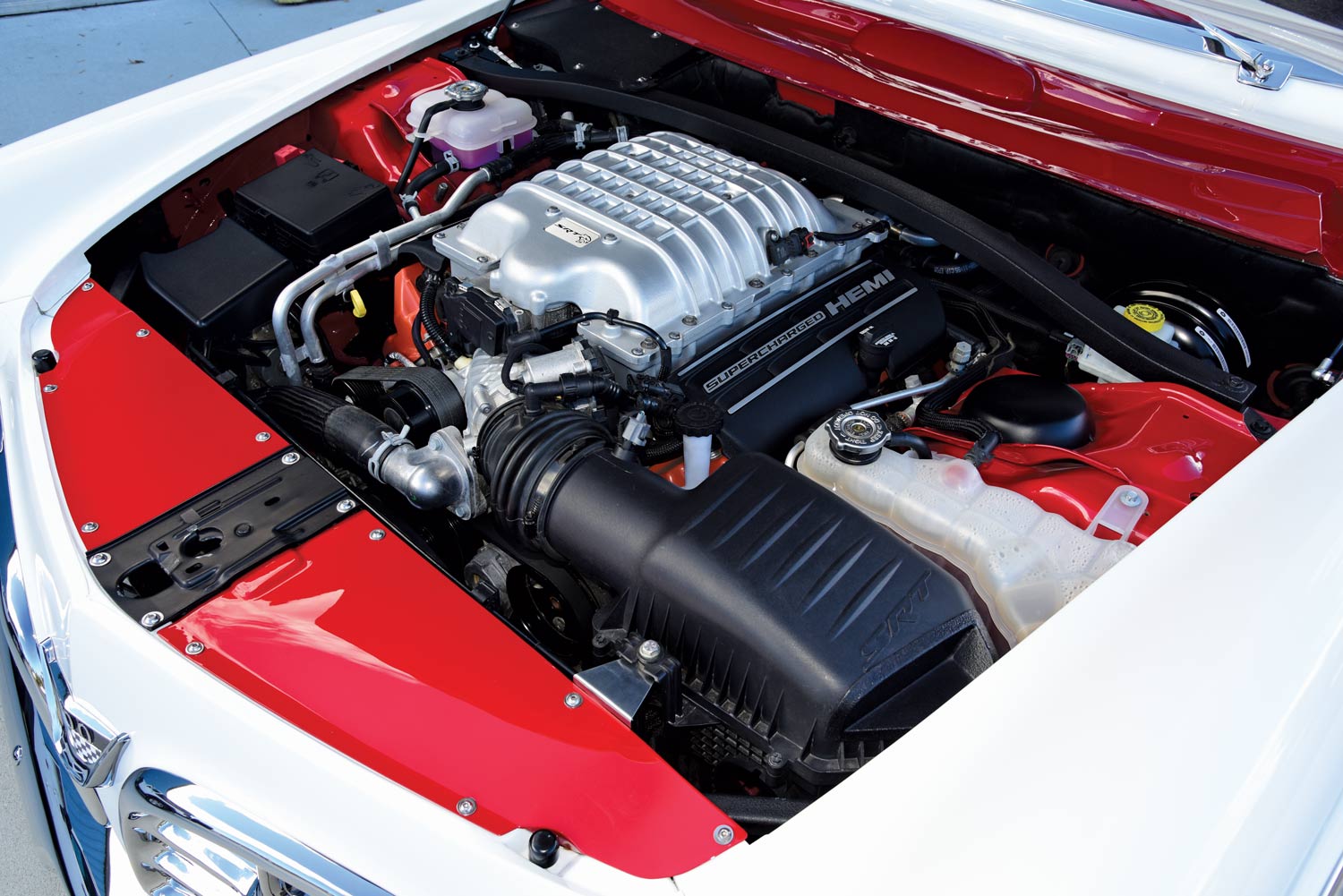 Hellcat engine in red engine bay