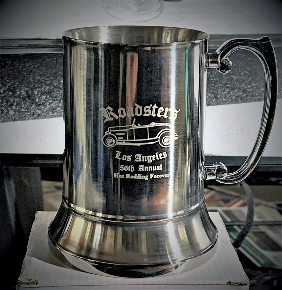 A steel mug that says Roasters