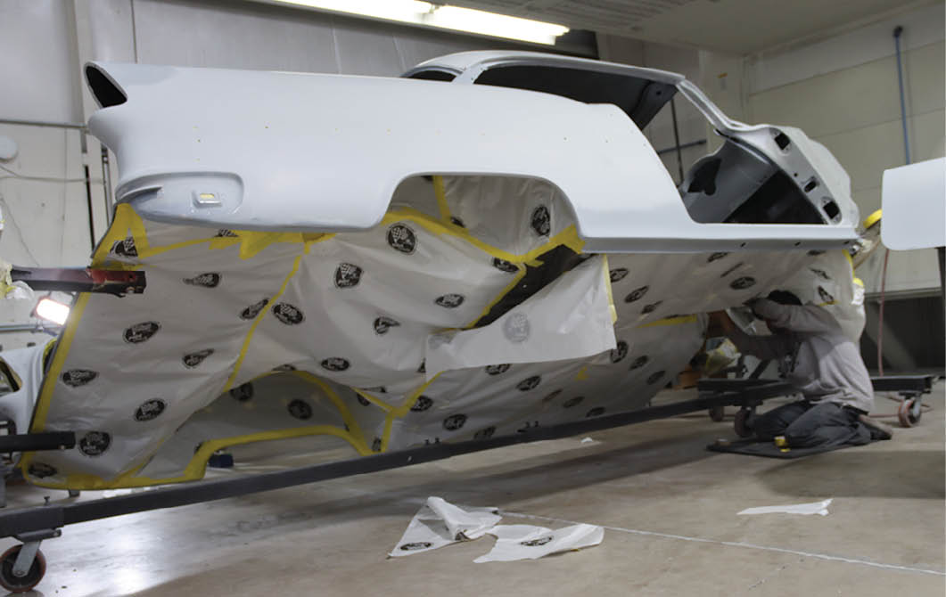 The chassis may not be there, but the bottom of this shell inevitably picked up heaps of dust since it was finished. Rather than try to clean the underside perfectly, Curiel just masked the area as he did elsewhere.