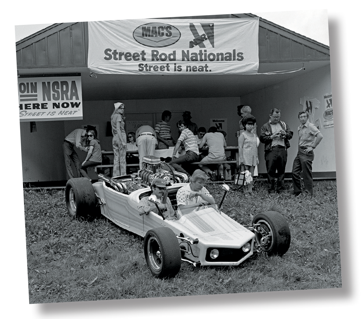 More from the 1972 Nats. This time it is the late-Cotton Werksman (driver seat) with another magazine guy gone too soon, Tom Senter, who at the time was on the Hot Rod staff. I remember shooting the feature on Werksman’s wild-looking, Indy-inspired, rear-engineered sort of Model T.
