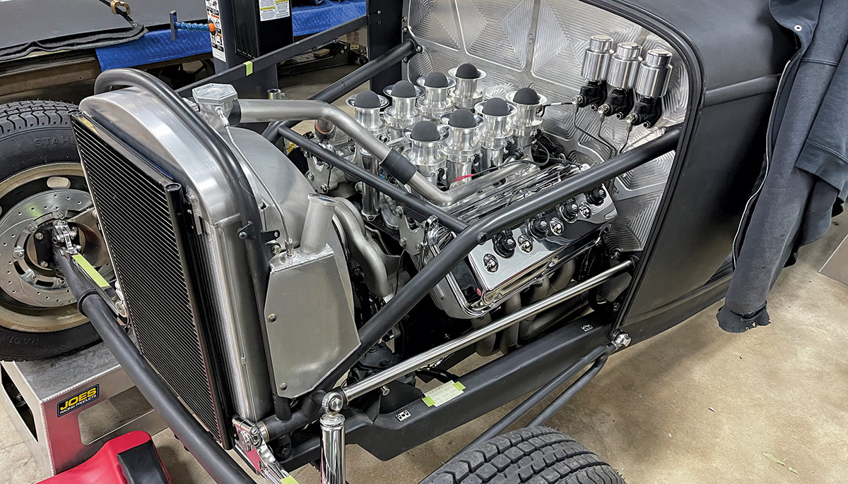 Power for Chisenhall’s AMBR winner comes from a ’56 Dodge Hemi with custom aluminum heads and electronic fuel injection. Check out details like the expansion tank on the radiator shroud and the milled firewall with three master cylinders–two for the brakes and one for the clutch.