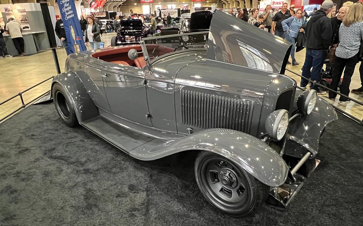 three quarter passenger side view of a gray Brookville-bodied ’32 Ford roadster