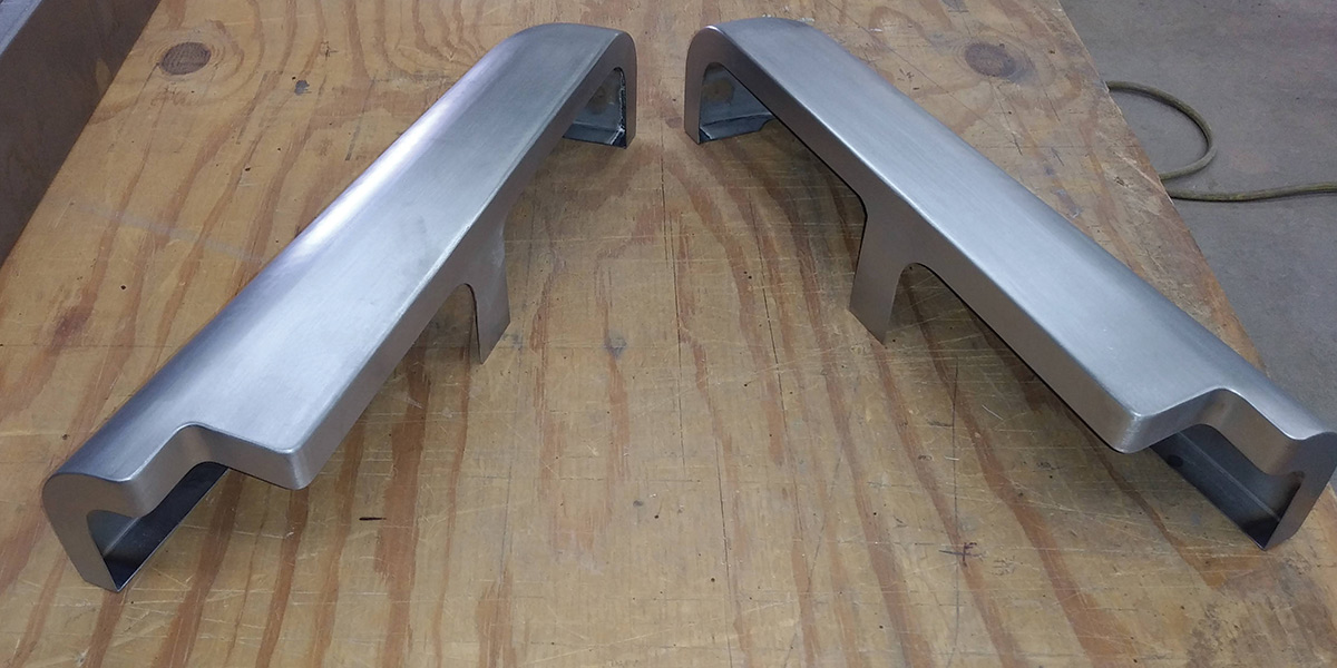 All the inner edges are given a uniform 1-1/4-inch flange, along with a tab for locating a stiffening bulkhead in the center.