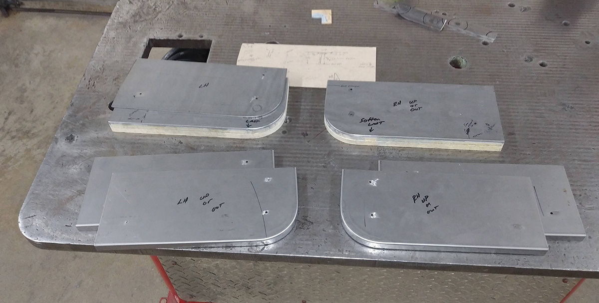 The roll pan will be made in three sections that bolt together. The flanges for joining the panels are created by hammerforming a 1/2-inch edge over custom-made forms.