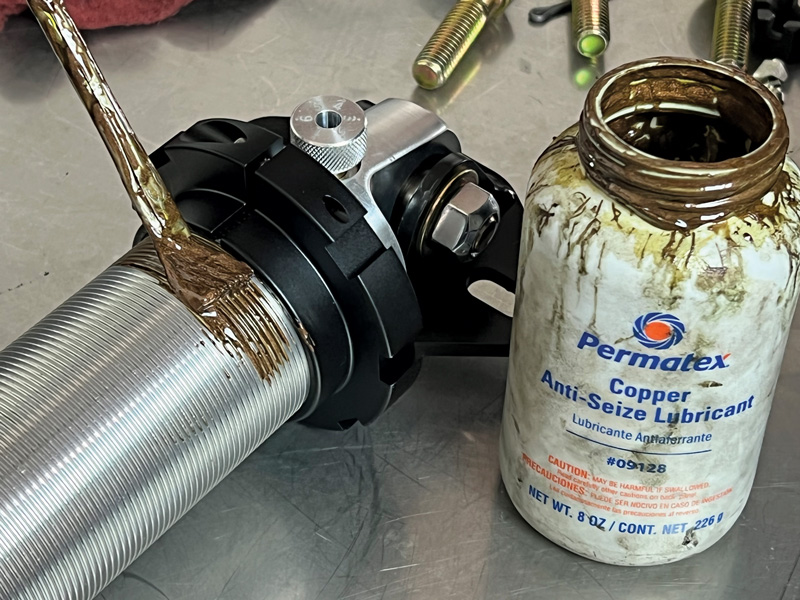 applying antiseize to coilover