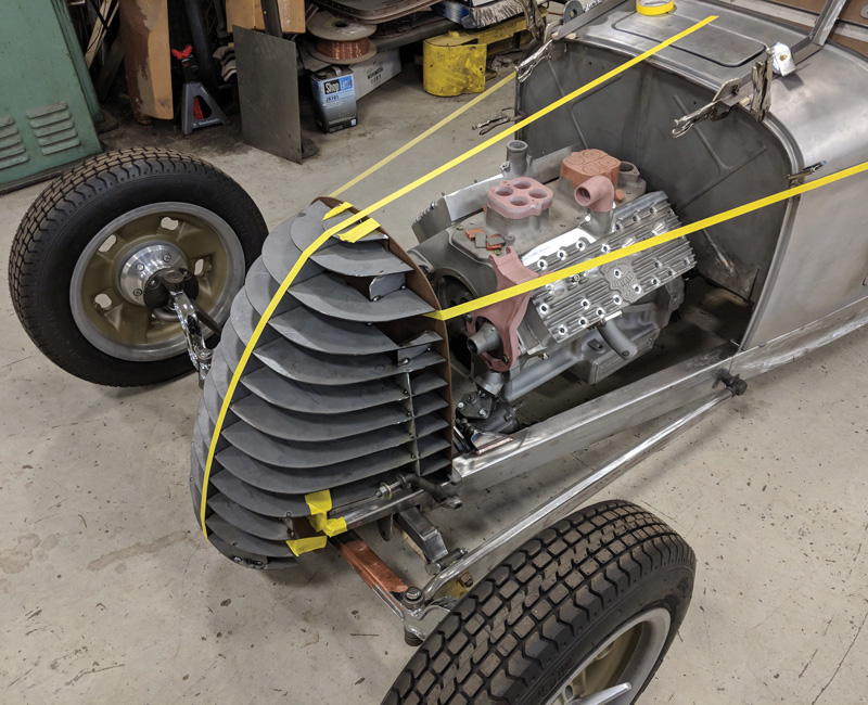 A more durable buck for the nose is laser cut from sheet steel and tack welded together. The engine in this car is a very special new aluminum Flathead from Motor City Flathead.