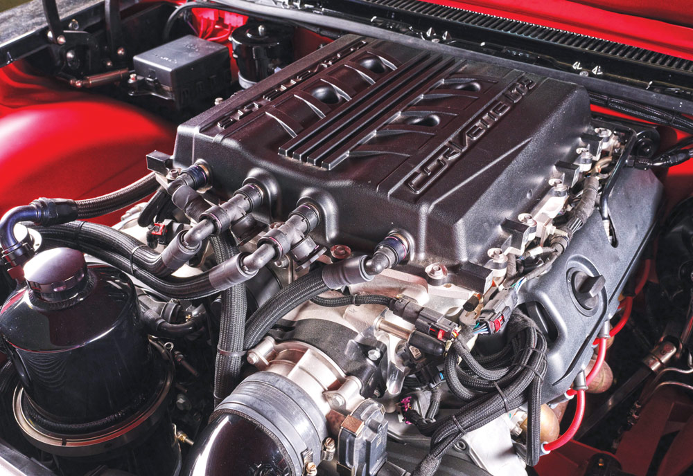 corvette engine with red engine bay inside impala