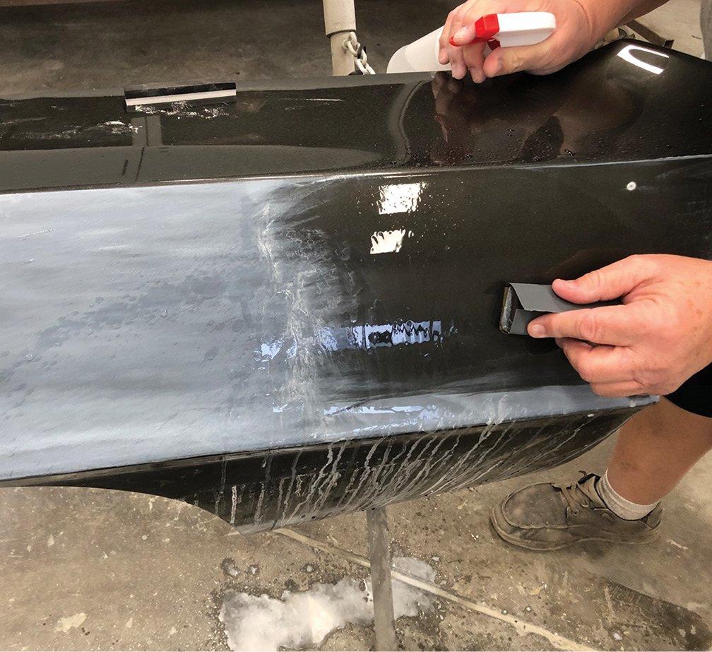 A large subtle curved area, but notice the narrow width of the sanding block allows the block to contact the surface fully.