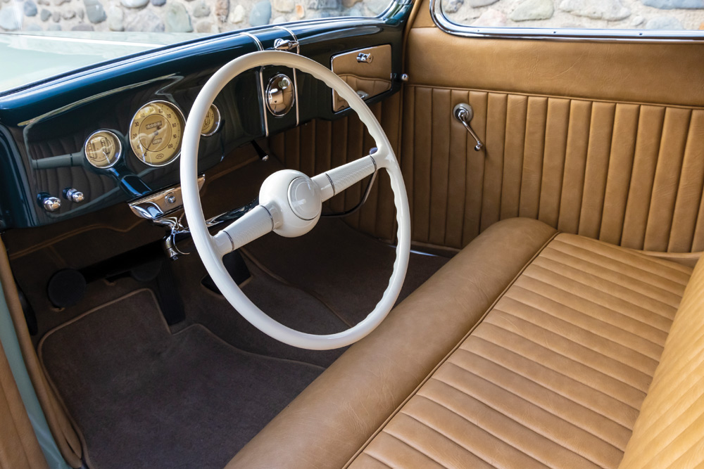 Coupe's gloss navy dashboard and steering wheel