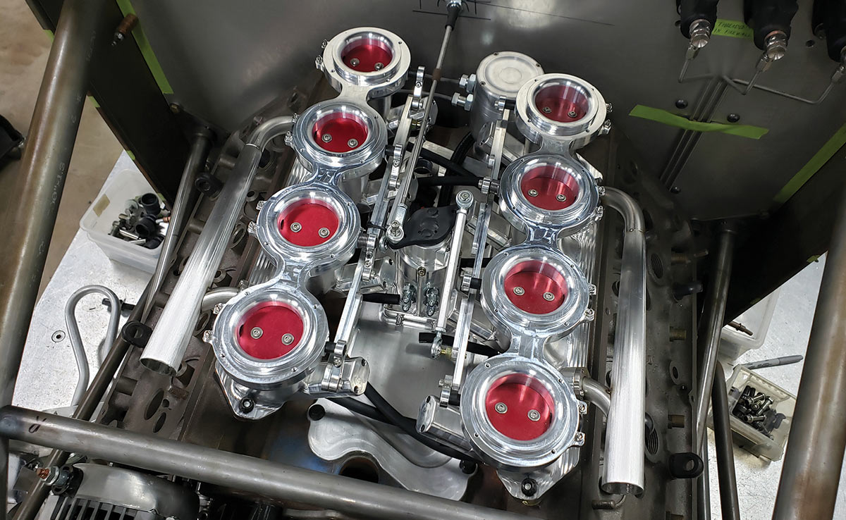 Red valves inside the throttle bodies