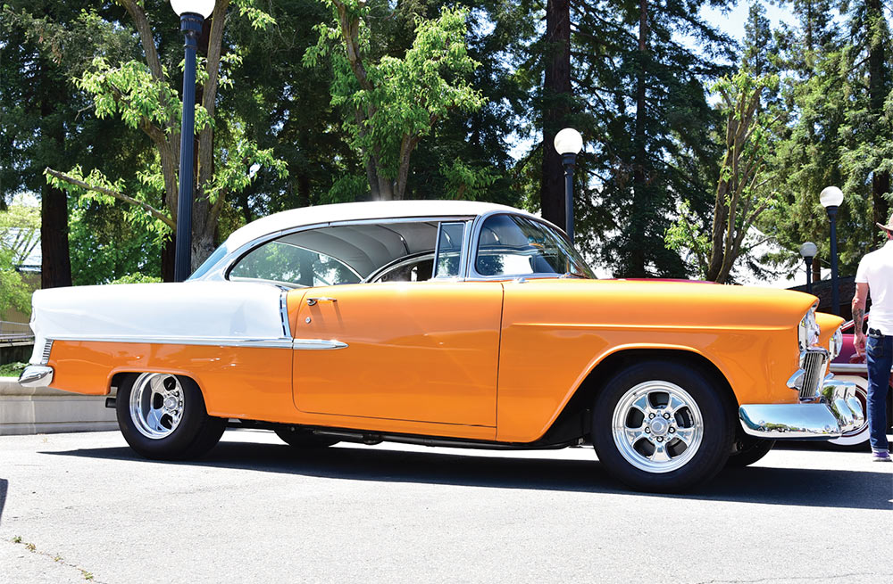 Light orange and white '55 Chevy coupe