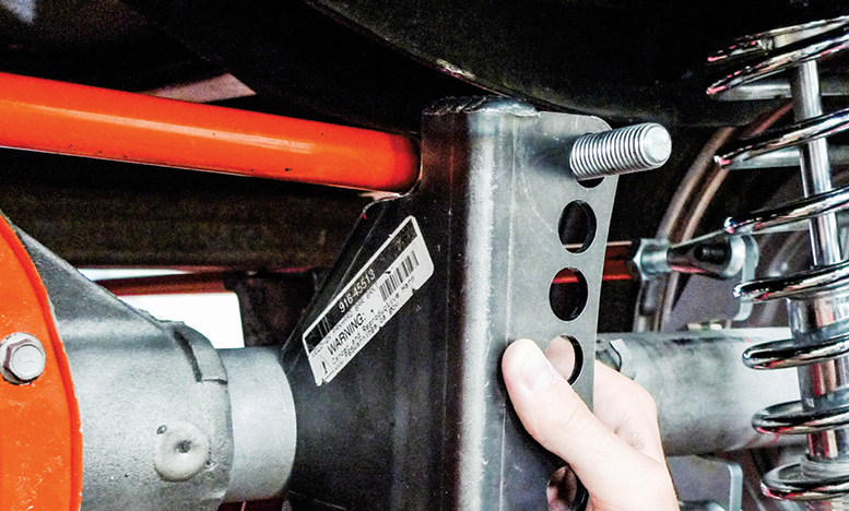 We believe this Panhard rod bracket is intended to be on the left where the opposite-end bracket is already welded. With a notch ground in for clearance, this’ll still work.