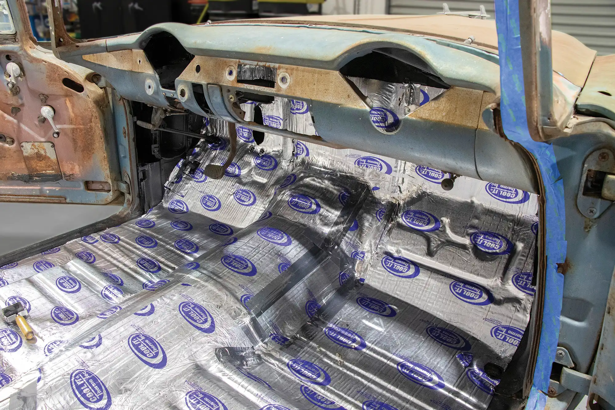 Thermo Tec Suppressor Acoustical and Heat Control Mats layed into '55 Chevy Wagon interior floor and firewall