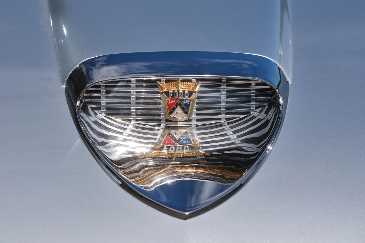 close view of the ’57 Ford Fairlane 500's hood vent and emblem
