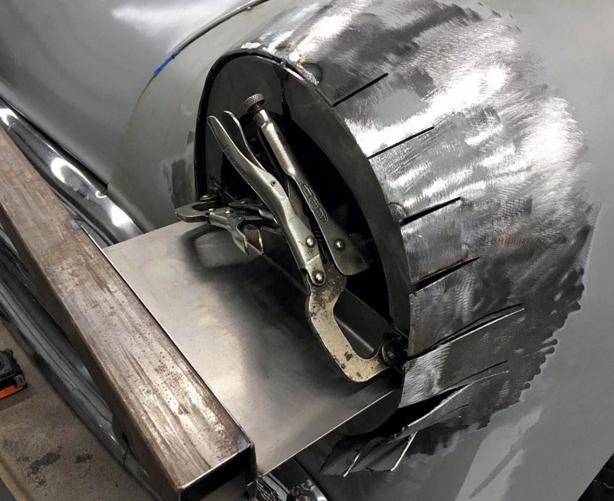 In keeping with the traditional custom tricks, ’55 Oldsmobile headlights were adapted to the Chevy fenders. A fixture was built to ensure both headlights would be on the exact same plane.