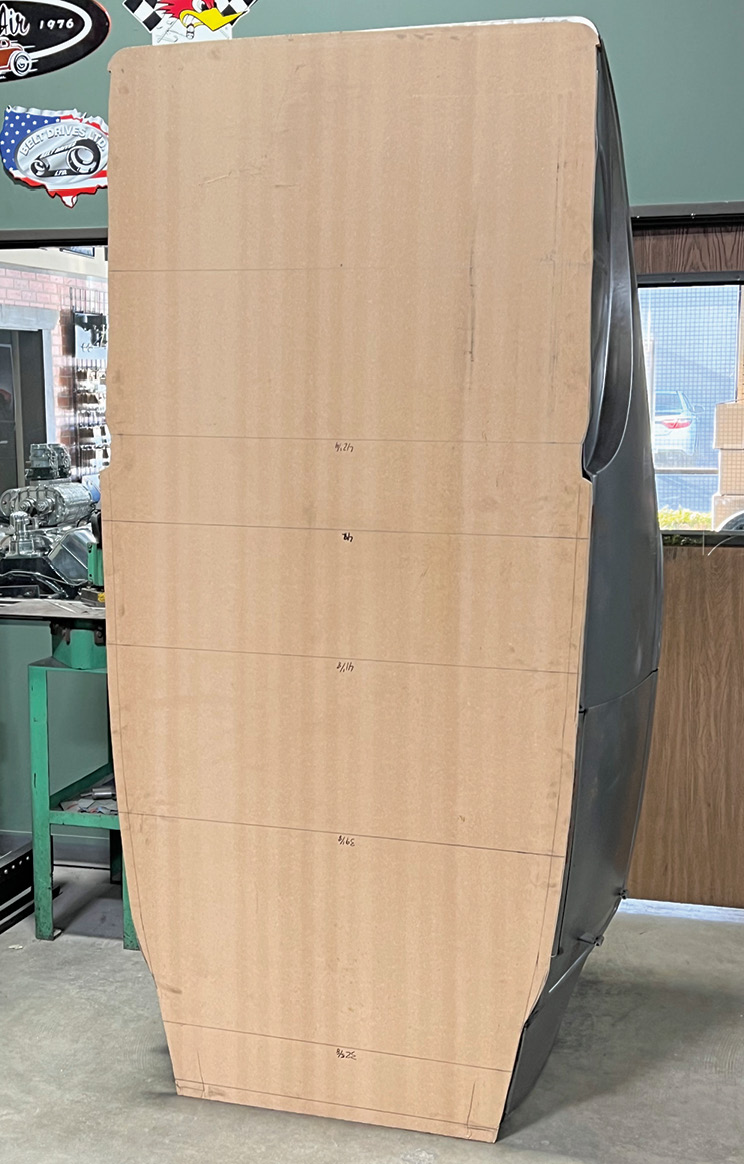 The first thing the Old Anvil crew did was create this plywood template with the dimensions of the Brookville Roadster body noted. This will allow the guys to carefully modify the ’32 framerails to follow the contours of the ’29 roadster.