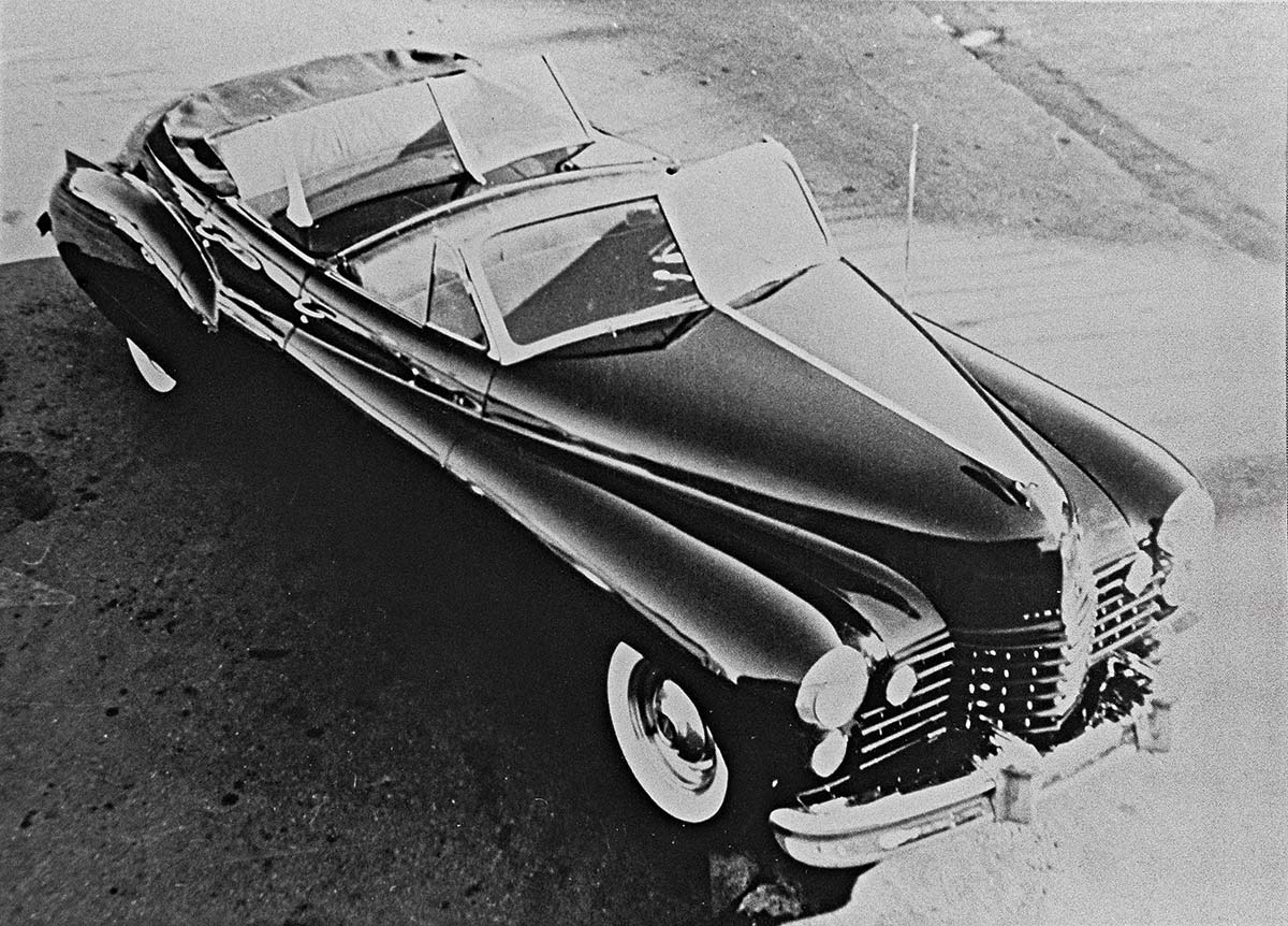Black & white photograph of the late ’40s where Tommy created this elegant dark green custom ’41 Caddy convertible for San Francisco society restauranteurs and show producers, Al and Katharine Williams, owners of the Papagayo Room in the Fairmont Hotel. Note the Duvall windscreen and separate passenger seating. Tommy no doubt learned bodywork at his uncle’s garage in Oakland.