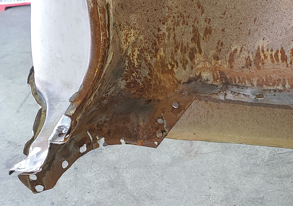 Having done a rough cut on the tailpan left a small section of the tailpan spot-welded to the inner quarter-panel piece, which then had its spot-welds drilled and the pieces pried apart.