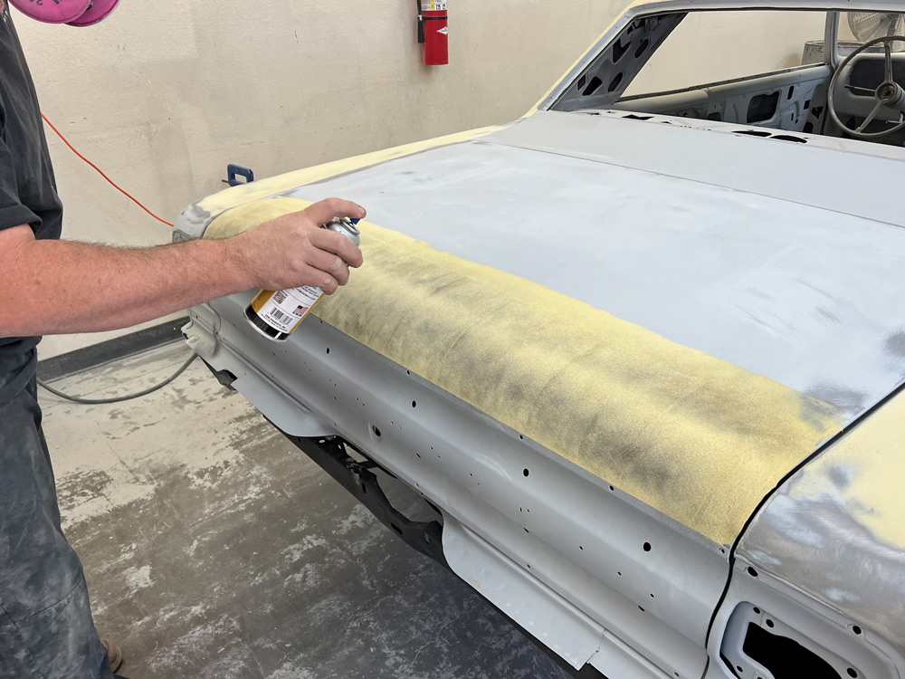 After Sinoris knocked the top off the filler, he dusted the surface with SEM guidecoat black. Remember that less is more in this application. Don’t blast the panel solid black.
