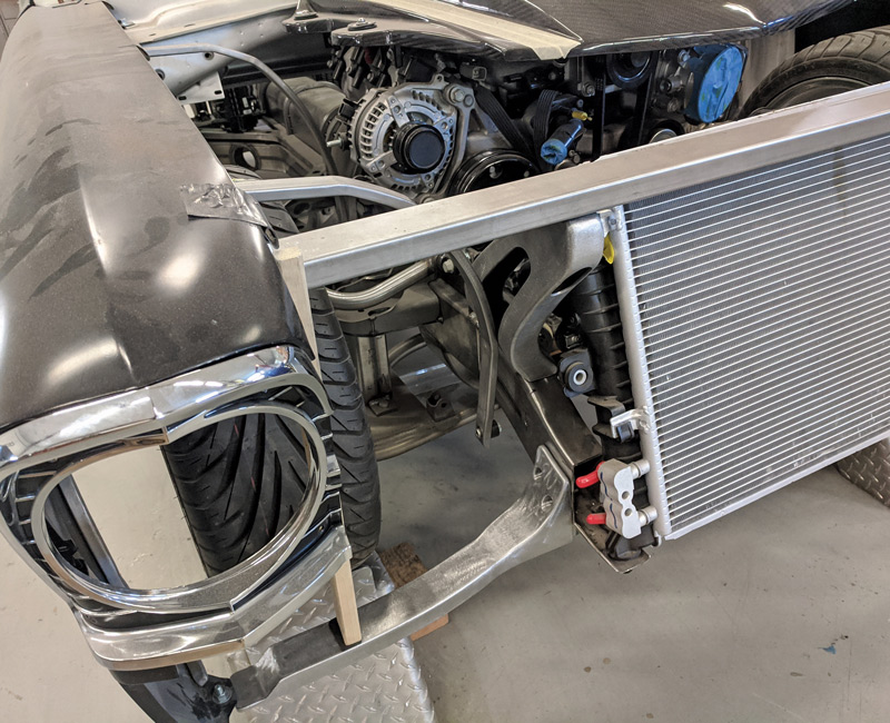 Since the Chevy Nova originally had a unibody construction with built-in inner fenders and radiator support, the guys at DSR had to start from scratch on the fender and radiator mounting arrangement.