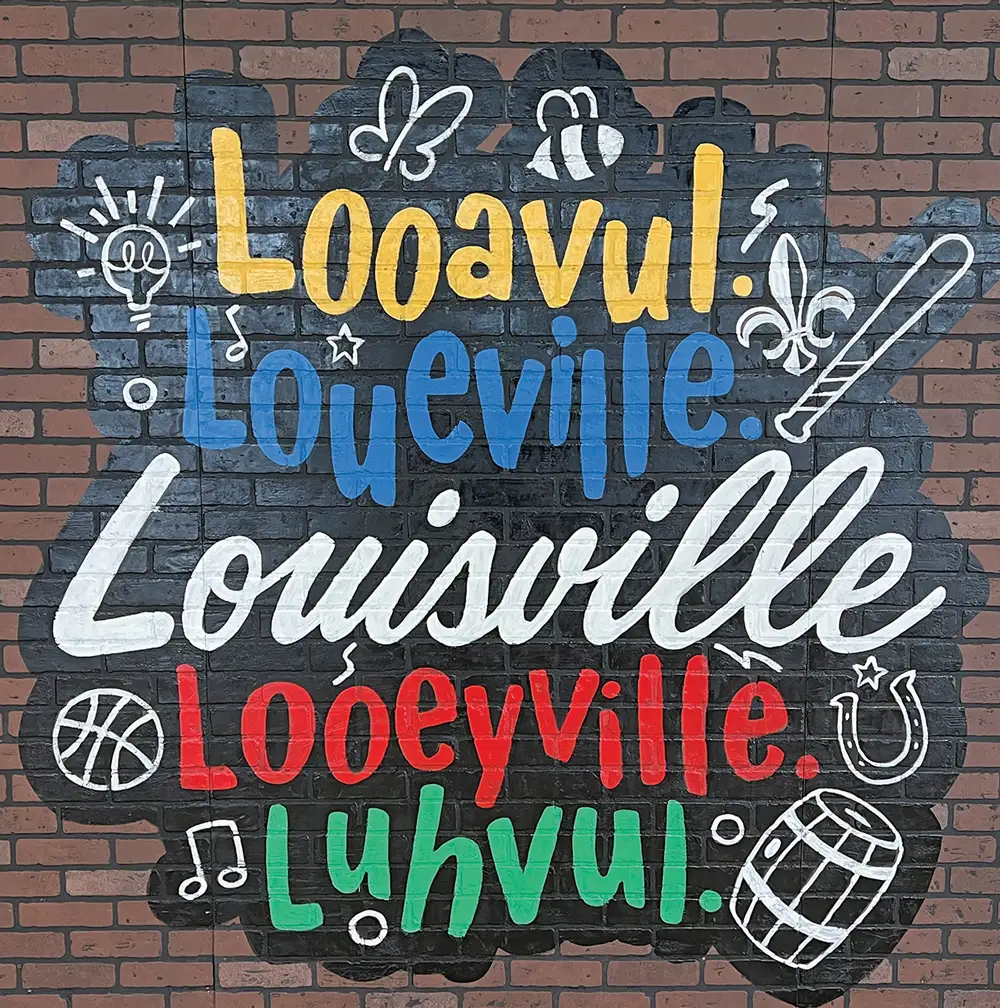 Typographic wall art showing various pronunciations of Louisville