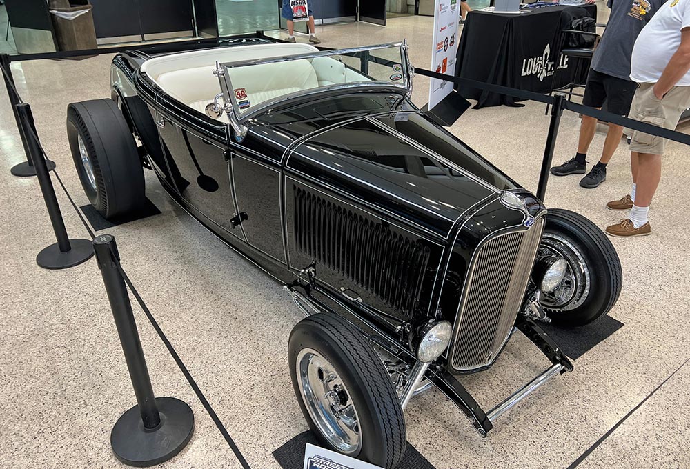 Black Deuce highboy roadster with white panel pinstriping