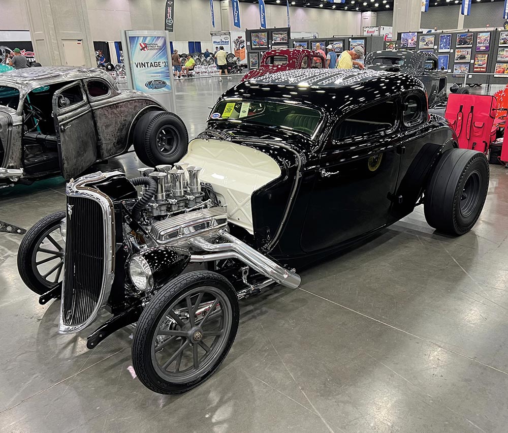 Black '33 Ford 5-window coupe with exposed engine