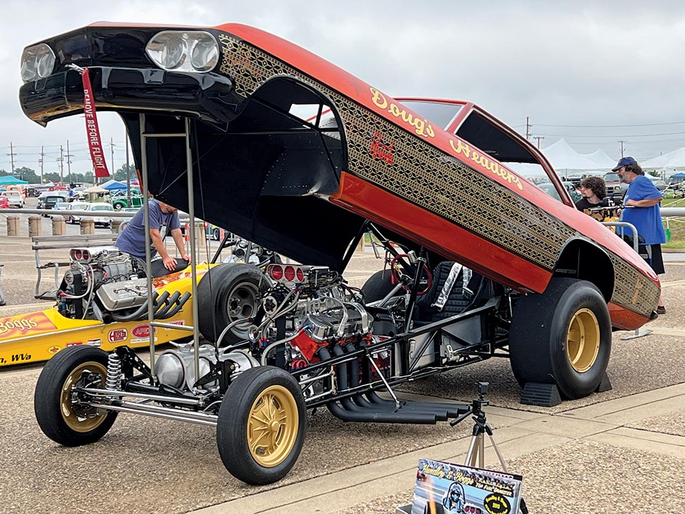 Orange '67 Corvair funny car with body in raised position